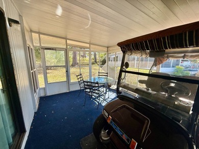 Home is located in Water Oak Country Club Estates, an active 55 on Water Oak Country Club Estates in Florida - for sale on GolfHomes.com, golf home, golf lot