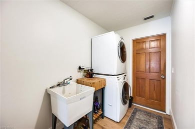 Welcome to this truly one-of-a-kind residence in Eagle Ridge on Eagle Ridge Golf and Tennis Club in Florida - for sale on GolfHomes.com, golf home, golf lot