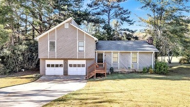 Welcome to this inviting split-level home located in the heart on Honey Creek Country Club in Georgia - for sale on GolfHomes.com, golf home, golf lot