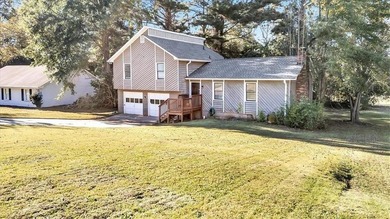 Welcome to this inviting split-level home located in the heart on Honey Creek Country Club in Georgia - for sale on GolfHomes.com, golf home, golf lot
