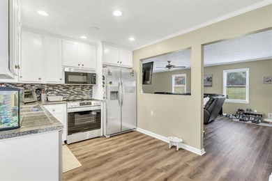 Welcome to this inviting split-level home located in the heart on Honey Creek Country Club in Georgia - for sale on GolfHomes.com, golf home, golf lot