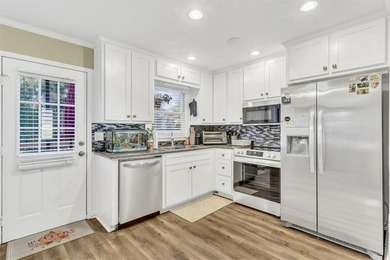 Welcome to this inviting split-level home located in the heart on Honey Creek Country Club in Georgia - for sale on GolfHomes.com, golf home, golf lot