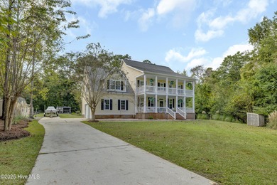Tucked away on 1.49 private acres, this William Poole-designed on Olde Point Golf and Country Club in North Carolina - for sale on GolfHomes.com, golf home, golf lot