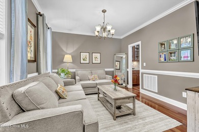 Tucked away on 1.49 private acres, this William Poole-designed on Olde Point Golf and Country Club in North Carolina - for sale on GolfHomes.com, golf home, golf lot