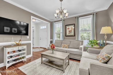 Tucked away on 1.49 private acres, this William Poole-designed on Olde Point Golf and Country Club in North Carolina - for sale on GolfHomes.com, golf home, golf lot