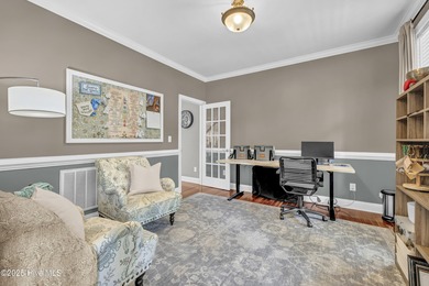 Tucked away on 1.49 private acres, this William Poole-designed on Olde Point Golf and Country Club in North Carolina - for sale on GolfHomes.com, golf home, golf lot