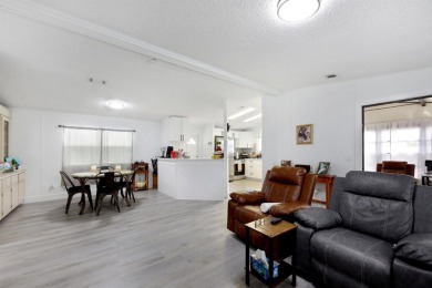 Step into modern comfort with this remodeled 1986 home situated on Maple Leaf Golf and Country Club in Florida - for sale on GolfHomes.com, golf home, golf lot