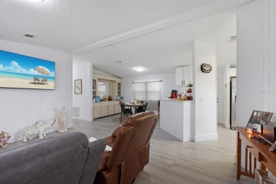 Step into modern comfort with this remodeled 1986 home situated on Maple Leaf Golf and Country Club in Florida - for sale on GolfHomes.com, golf home, golf lot