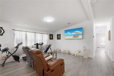 Step into modern comfort with this remodeled 1986 home situated on Maple Leaf Golf and Country Club in Florida - for sale on GolfHomes.com, golf home, golf lot