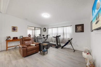 Step into modern comfort with this remodeled 1986 home situated on Maple Leaf Golf and Country Club in Florida - for sale on GolfHomes.com, golf home, golf lot