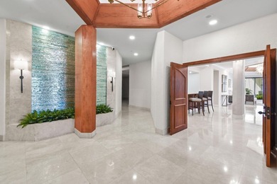 Step into this exquisitely reimagined condo in the prestigious on Jonathans Landing Golf Club in Florida - for sale on GolfHomes.com, golf home, golf lot