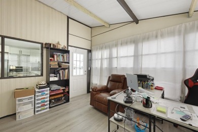 Step into modern comfort with this remodeled 1986 home situated on Maple Leaf Golf and Country Club in Florida - for sale on GolfHomes.com, golf home, golf lot