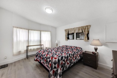 Step into modern comfort with this remodeled 1986 home situated on Maple Leaf Golf and Country Club in Florida - for sale on GolfHomes.com, golf home, golf lot