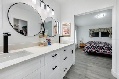 Step into modern comfort with this remodeled 1986 home situated on Maple Leaf Golf and Country Club in Florida - for sale on GolfHomes.com, golf home, golf lot