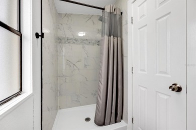 Step into modern comfort with this remodeled 1986 home situated on Maple Leaf Golf and Country Club in Florida - for sale on GolfHomes.com, golf home, golf lot