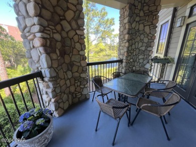 This corner condo home has a premium and unique view! Wild Heron on Sharks Tooth Golf Club in Florida - for sale on GolfHomes.com, golf home, golf lot