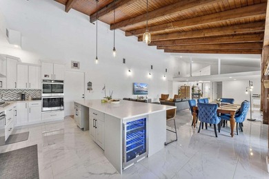 Modern yet inviting, this reimagined residence offers 2,897 sqft on Ocean Breeze Golf and Country Club in Florida - for sale on GolfHomes.com, golf home, golf lot