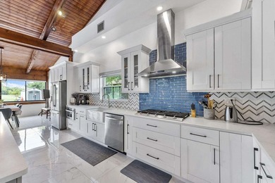 Modern yet inviting, this reimagined residence offers 2,897 sqft on Ocean Breeze Golf and Country Club in Florida - for sale on GolfHomes.com, golf home, golf lot
