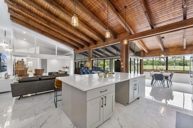 Modern yet inviting, this reimagined residence offers 2,897 sqft on Ocean Breeze Golf and Country Club in Florida - for sale on GolfHomes.com, golf home, golf lot