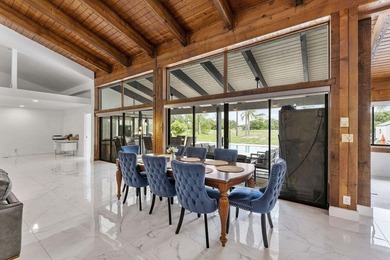 Modern yet inviting, this reimagined residence offers 2,897 sqft on Ocean Breeze Golf and Country Club in Florida - for sale on GolfHomes.com, golf home, golf lot