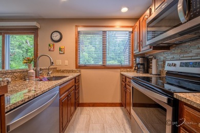 Enjoy added peace and quiet in this desirable end-unit location on Eagle Ridge Inn and Resort in Illinois - for sale on GolfHomes.com, golf home, golf lot