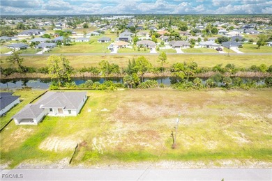 Fantastic waterfront lot in Northeast Cape Coral offering a rare on Del Tura Golf and Country Club in Florida - for sale on GolfHomes.com, golf home, golf lot
