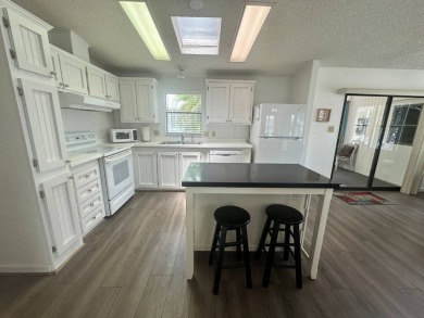 This well-cared for home is located only steps from one of the on Del Tura Golf and Country Club in Florida - for sale on GolfHomes.com, golf home, golf lot