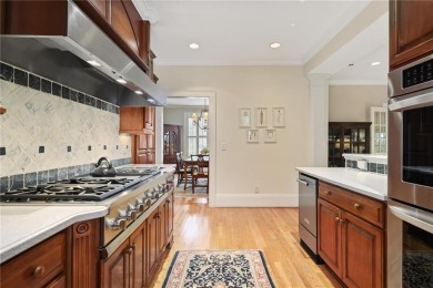 Charming brick and stone beauty nestled in the heart of on Bobby Jones Golf Club in Georgia - for sale on GolfHomes.com, golf home, golf lot