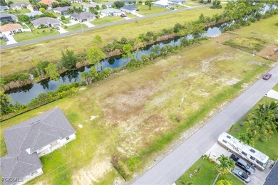Fantastic waterfront lot in Northeast Cape Coral offering a rare on Del Tura Golf and Country Club in Florida - for sale on GolfHomes.com, golf home, golf lot