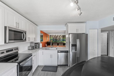 Stunningly renovated 2-bedroom, 2-bathroom condo located in a on Indian Spring Golf and Country Club in Florida - for sale on GolfHomes.com, golf home, golf lot