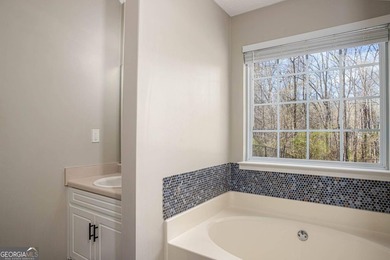 Welcome home to this charming 3-bedroom, 2-bath ranch nestled in on Monroe Golf and Country Club in Georgia - for sale on GolfHomes.com, golf home, golf lot