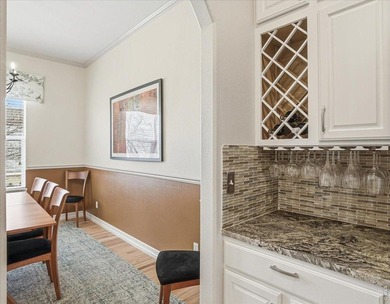 Beautifully updated ranch with a fully finished basement in a on Highland Meadows Golf Course in Colorado - for sale on GolfHomes.com, golf home, golf lot