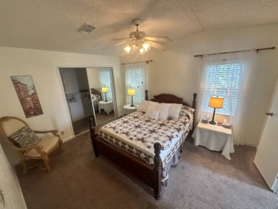 This well-cared for home is located only steps from one of the on Del Tura Golf and Country Club in Florida - for sale on GolfHomes.com, golf home, golf lot