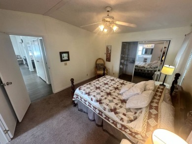 This well-cared for home is located only steps from one of the on Del Tura Golf and Country Club in Florida - for sale on GolfHomes.com, golf home, golf lot