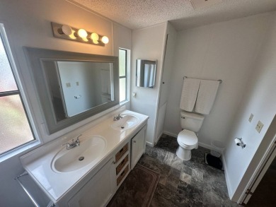 This well-cared for home is located only steps from one of the on Del Tura Golf and Country Club in Florida - for sale on GolfHomes.com, golf home, golf lot