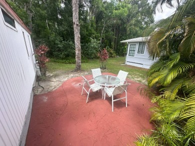 This well-cared for home is located only steps from one of the on Del Tura Golf and Country Club in Florida - for sale on GolfHomes.com, golf home, golf lot