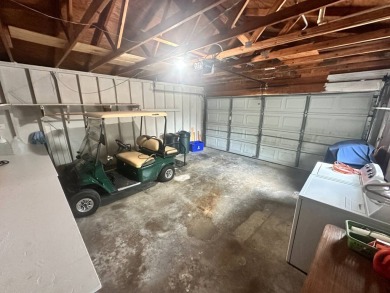 This well-cared for home is located only steps from one of the on Del Tura Golf and Country Club in Florida - for sale on GolfHomes.com, golf home, golf lot