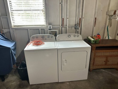 This well-cared for home is located only steps from one of the on Del Tura Golf and Country Club in Florida - for sale on GolfHomes.com, golf home, golf lot