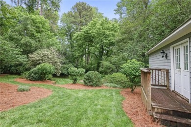 Charming brick and stone beauty nestled in the heart of on Bobby Jones Golf Club in Georgia - for sale on GolfHomes.com, golf home, golf lot