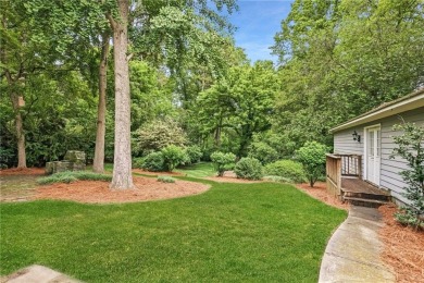 Charming brick and stone beauty nestled in the heart of on Bobby Jones Golf Club in Georgia - for sale on GolfHomes.com, golf home, golf lot