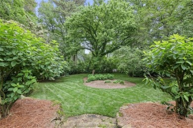 Charming brick and stone beauty nestled in the heart of on Bobby Jones Golf Club in Georgia - for sale on GolfHomes.com, golf home, golf lot