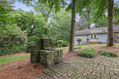 Charming brick and stone beauty nestled in the heart of on Bobby Jones Golf Club in Georgia - for sale on GolfHomes.com, golf home, golf lot