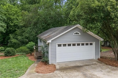 Charming brick and stone beauty nestled in the heart of on Bobby Jones Golf Club in Georgia - for sale on GolfHomes.com, golf home, golf lot