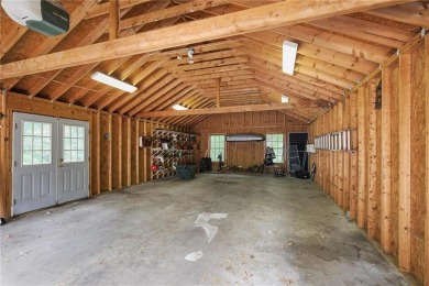 Charming brick and stone beauty nestled in the heart of on Bobby Jones Golf Club in Georgia - for sale on GolfHomes.com, golf home, golf lot