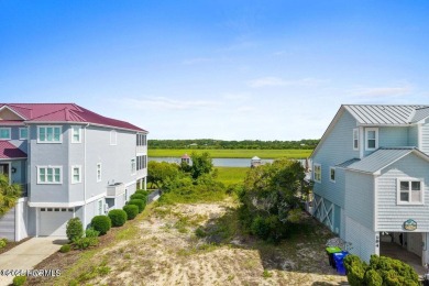Enjoy stunning views from this Jinx Creek waterfront lot, with on Sea Trail Golf Resort in North Carolina - for sale on GolfHomes.com, golf home, golf lot