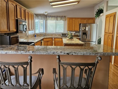 This manufactured home in the popular Jack Ivey Ranch for on Ivey Ranch Country Club in California - for sale on GolfHomes.com, golf home, golf lot