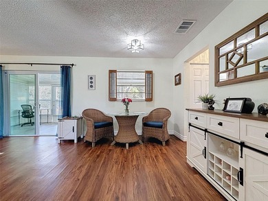 Check out this amazing single-story condo in a pet-friendly 55+ on Summertree Golf Course in Florida - for sale on GolfHomes.com, golf home, golf lot