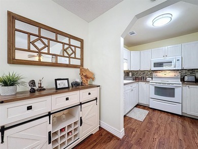 Check out this amazing single-story condo in a pet-friendly 55+ on Summertree Golf Course in Florida - for sale on GolfHomes.com, golf home, golf lot