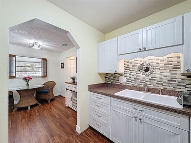 Check out this amazing single-story condo in a pet-friendly 55+ on Summertree Golf Course in Florida - for sale on GolfHomes.com, golf home, golf lot