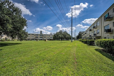 Welcome Home to Unit 52 in The Flamenco, Building 79! Step into on On Top Of The World Golf Course in Florida - for sale on GolfHomes.com, golf home, golf lot